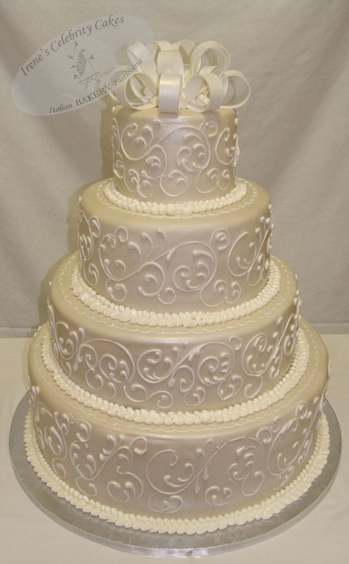 Four-tier white wedding cake